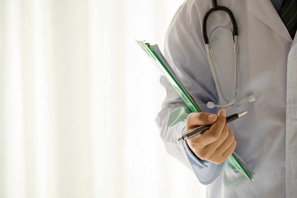 Medical physician doctor man over white background.